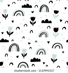 Scandinavian vector pattern with flowers, rainbows, clouds and abstract shapes in black and mint. Graphic childish seamless print.