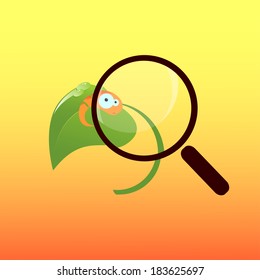 Scared caterpillar sitting on a leaf under a magnifying glass