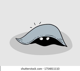Scared and hidden under blanket