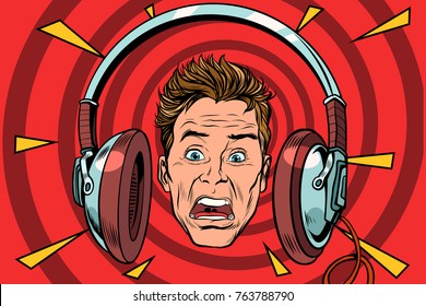 A scared man wearing headphones. Pop art retro vector illustration