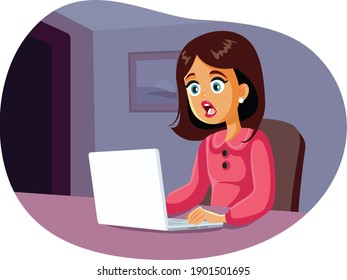 Scared Woman Looking at Laptop Computer Screen. Shocked girl watching a video on her notebook computer at home
