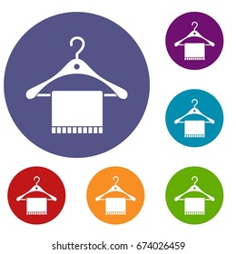 Scarf on coat hanger icons set in flat circle reb, blue and green color for web