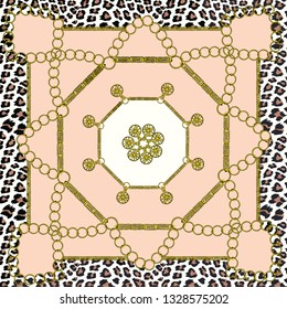Scarf with a pattern of leopard spots, gold chains and pendants.