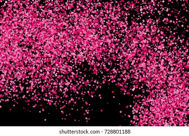 Scarlet explosion of confetti isolated on black. Valentines Day background. Pink glitter texture.  Vector illustration,eps 10.