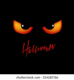 scary eyes on a black background for a card for Halloween