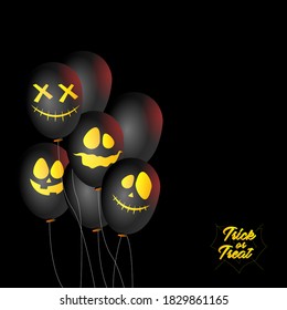 Diseño de globos faciales atemorizantes con truco o tratamiento de texto sobre fondo negro