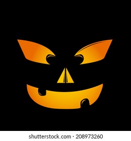 a scary face of a pumpkin in a black background