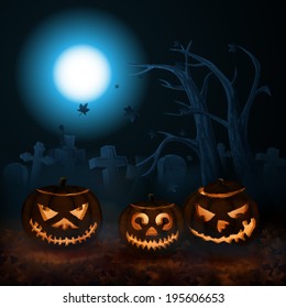 Scary Halloween pumpkins on the mist-shrouded cemetery.