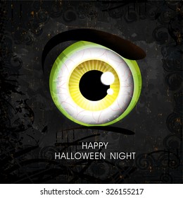 Scary monster eyes on grungy background for Happy Halloween Night Party celebration.