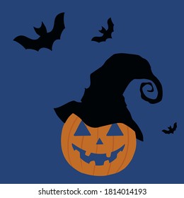 scary smiling orange pumpkin with witch's had and bats on blue background