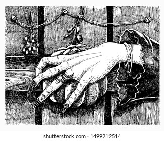 Scary witch's hand with long crooked fingers. Vector illustration in graphic style for Halloween. Hand drawing with the image of a pumpkin, a bat, a ring in the form of a snake, a spider