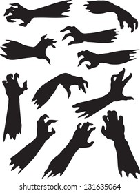 Scary zombie hands silhouettes.