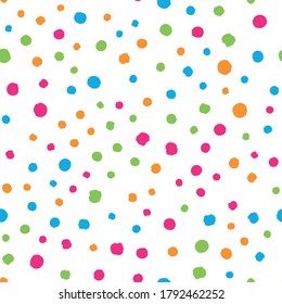 Scattered colorful brush dots. Seamless background pattern. Abstract vector wallpaper.