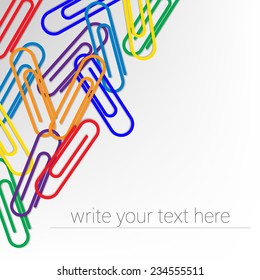 Scattered different colored paperclips. Design. Cover sheet. Background. Rainbow