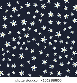 Scattered florals on dark background seamless pattern. Simple elegant repeating print for textile design, backdrop, paper. 