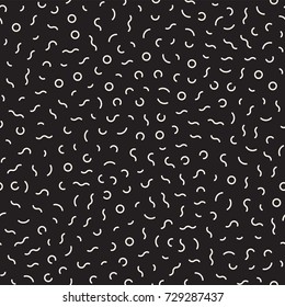 Scattered Geometric Shapes. Inspired by Memphis Style. Abstract Background Design. Vector Seamless Black and White Irregular Pattern.