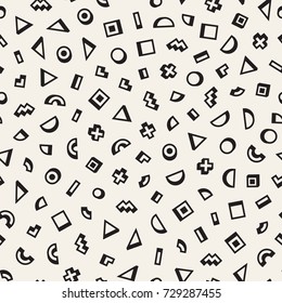Scattered Geometric Shapes. Inspired by Memphis Style. Abstract Background Design. Vector Seamless Black and White Irregular Pattern.