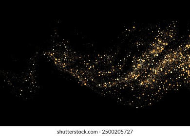 Scattered golden particles on dark background. Holiday background or design element. New Year and Christmas