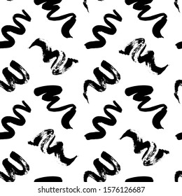 Scattered ink dry brush strokes vector seamless pattern. Minimal hand drawn texture with black paint scribbles. Monochrome freehand curls, wavy lines abstract background. Creative wallpaper design