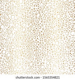 Scattered irregular golden seamless pattern. Interesting gold texture. Repeating nice abstract design for gift pack, fabric, wallpaper, wrapping paper, wrapper, packaging, package, interior, prints