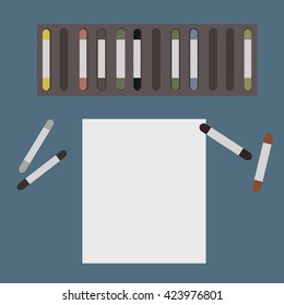 scattered pastel chalks in the workplace