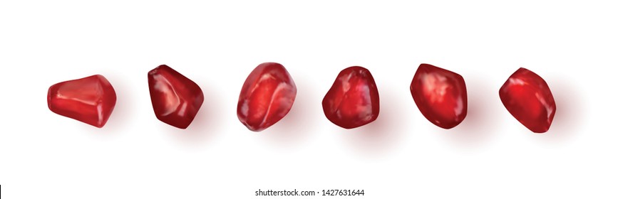 Scattered pomegranate seeds isolated on white background. Red punica granatum juicy grains top view