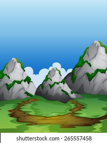 Scene of field with mountains in the background
