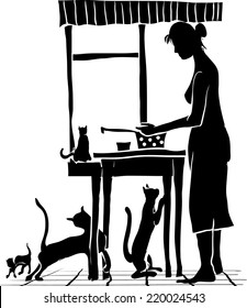 Scene in the kitchen with cats