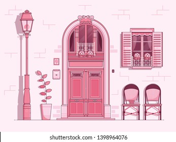 Scene with vintage french wooden door, traditional window with shutters, curtains and flowers in pots, retro forged lantern on lamppost and two wicker chairs. Postcard with romantic Paris scenic view.