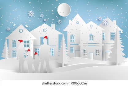 scenery in the winter with families in front of the house and snowy hills. design paper art and crafts