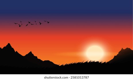 Scenic sunset over mountains with flying birds and grass silhouette