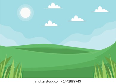 scenic view of grassy land and green mountains and blue sky and sun in the background 