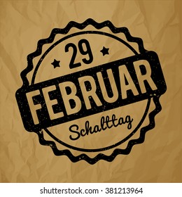 Schalttag 29 Februar Stempel German black on a crumpled paper brown background.