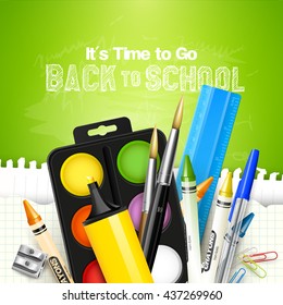 School background with school supplies on green background