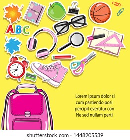School backpack with school stationery, books, pencils, sneakers, alarm clock and other school items on a yellow background