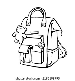 Mochila escolar con oso de peluche negro y blanco aislado en fondo blanco
