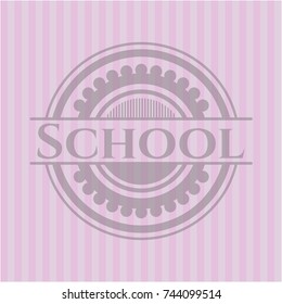 School badge with pink background