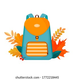 Schultasche und Herbstblätter.