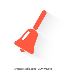 school bell in orange with drop shadow on white