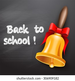 School bell with red ribbon