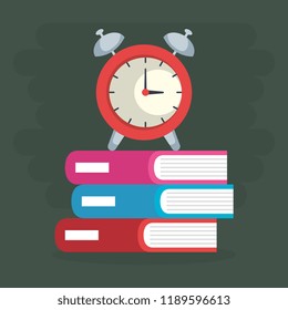 school books and alarm clock
