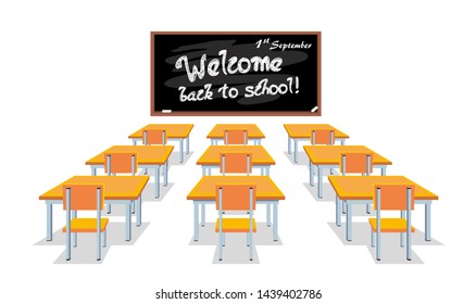 School chalkboard and desks. The inscription "Welcome back to school!" on the blackboard, elementary classroom with wooden desks  and chairs 