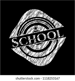 School chalkboard emblem written on a blackboard