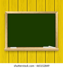 School chalkboard on wooden background