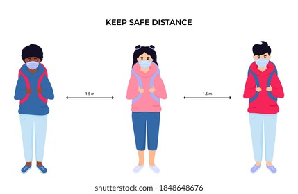School children in protective face masks. Keep social distance. Preventive measures during the coronavirus pandemic coivd-19