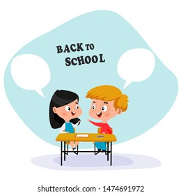 School children sit at school desk and discussing something. Back to school concept