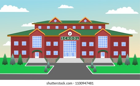 School, classic brick two-storey building with three entrances and a clock in the center, against the blue sky, with lawn, paths, fir and fir trees