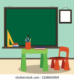 School classroom with blackboard and desk