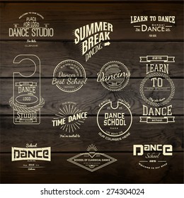  School of Dance badges logos and labels for any use, on wooden background texture