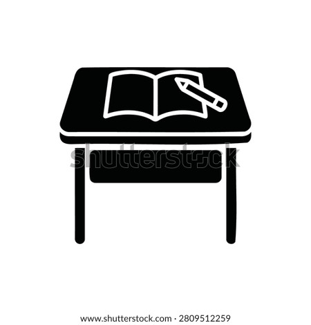 School desk with an open book and pencil silhouette icon